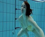 Shaved pussy babe Poleshuk swims and strips from das swimming