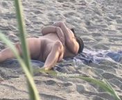 Spying hot MILF touching at the beach from nude spying